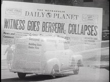 Daily Planet paper with the headline "Witness goes berserk, collapses"